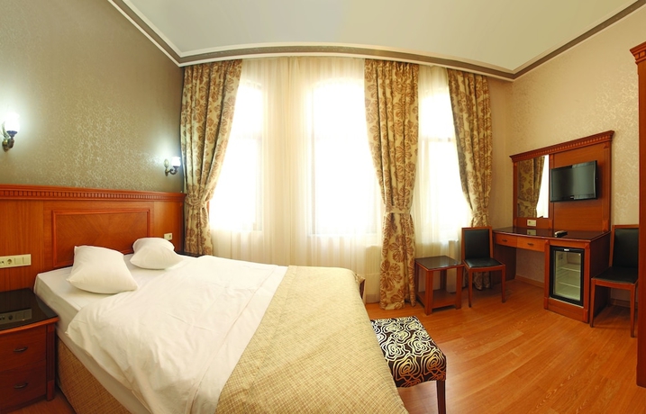 Imagen de la habitación del Hotel New House. Foto 4