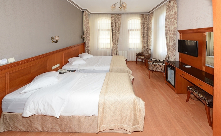 Imagen de la habitación del Hotel New House. Foto 8