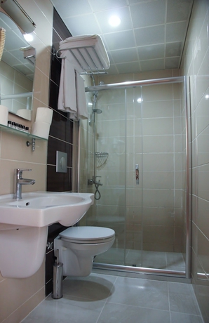 Imagen de la habitación del Hotel New House. Foto 16