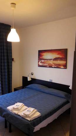 Imagen de la habitación del Hotel New Marilu. Foto 5