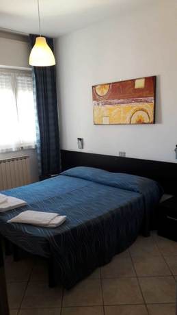 Imagen de la habitación del Hotel New Marilu. Foto 7