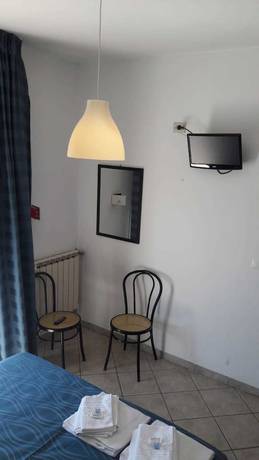 Imagen de la habitación del Hotel New Marilu. Foto 12