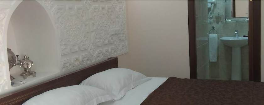 Imagen de la habitación del Hotel New Star Khiva. Foto 18