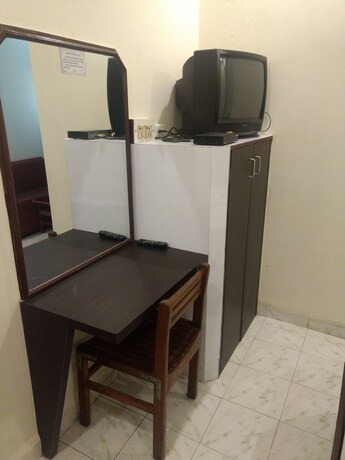 Imagen de la habitación del Hotel New Sunder. Foto 19