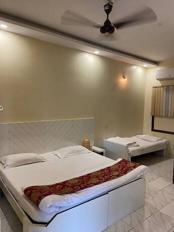 Imagen de la habitación del Hotel New Sunder. Foto 20