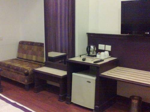 Imagen de la habitación del Hotel Niky International. Foto 4