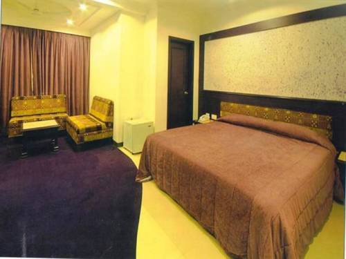 Imagen de la habitación del Hotel Niky International. Foto 6