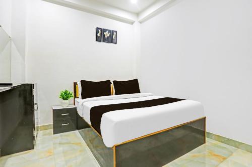 Imagen de la habitación del Hotel O THE MARUTI PAYING GUEST HOUSE. Foto 19