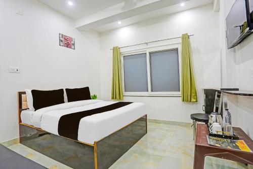 Imagen general del Hotel O THE MARUTI PAYING GUEST HOUSE. Foto 15