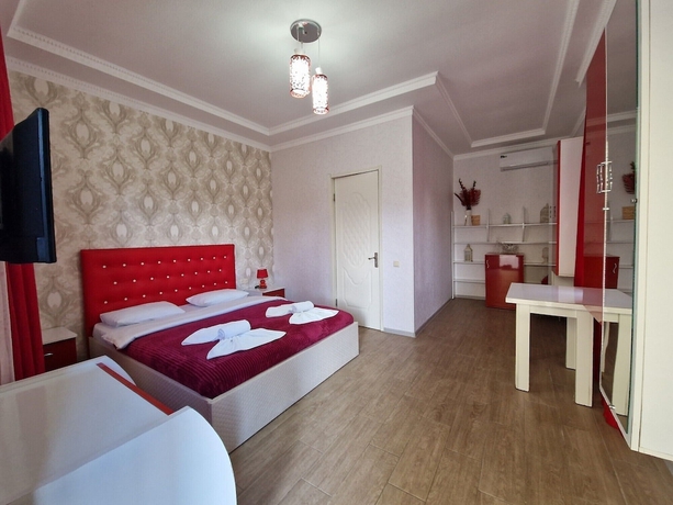 Imagen de la habitación del Hotel Oasis Villa. Foto 4