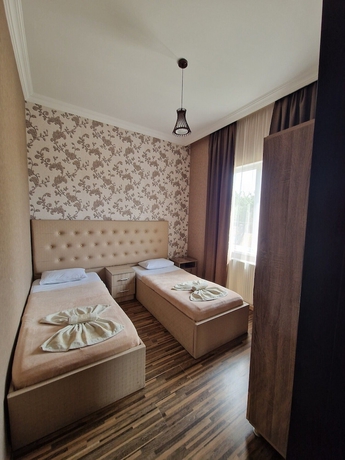 Imagen de la habitación del Hotel Oasis Villa. Foto 6