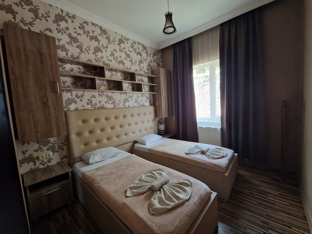 Imagen de la habitación del Hotel Oasis Villa. Foto 7