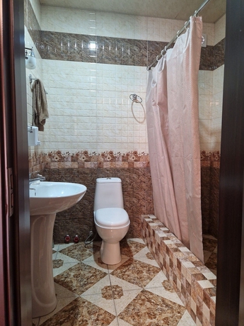 Imagen de la habitación del Hotel Oasis Villa. Foto 10