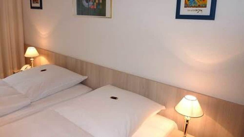 Imagen de la habitación del Hotel Occam. Foto 16