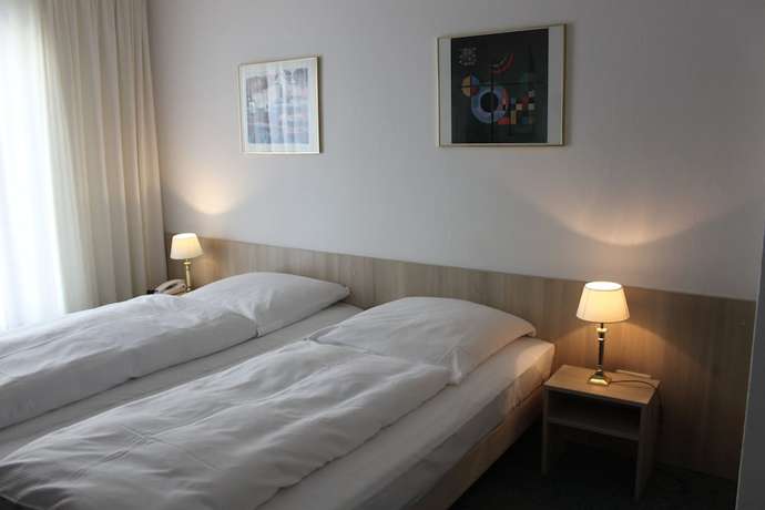 Imagen de la habitación del Hotel Occam. Foto 17