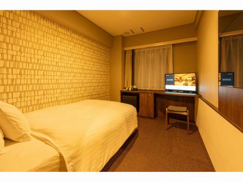 Imagen de la habitación del Hotel Odashima. Foto 14