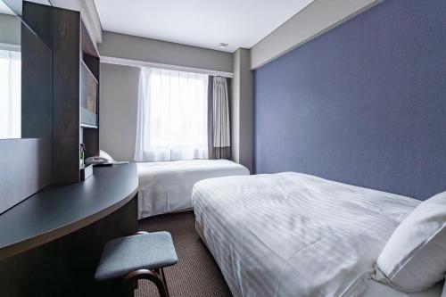 Imagen de la habitación del Hotel Odashima. Foto 17