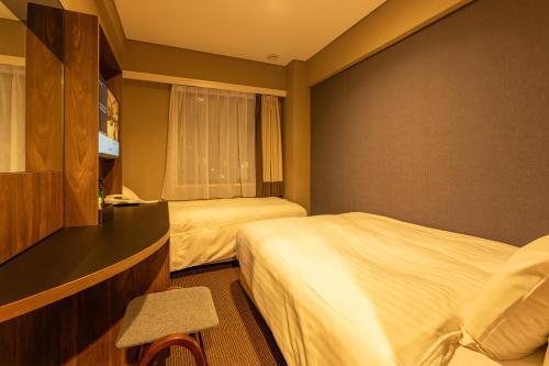 Imagen de la habitación del Hotel Odashima. Foto 20