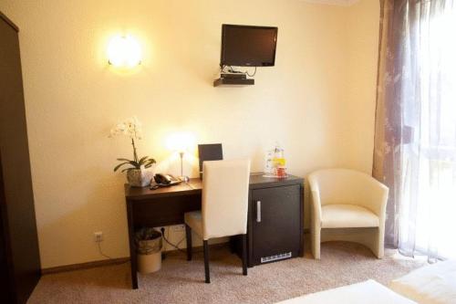 Imagen de la habitación del Hotel O\'felder. Foto 5