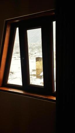 Imagen de la habitación del Hotel Old House Mestia. Foto 9