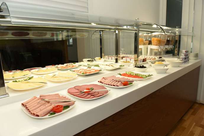 Imagen del bar/restaurante del Hotel Olive Inn. Foto 5