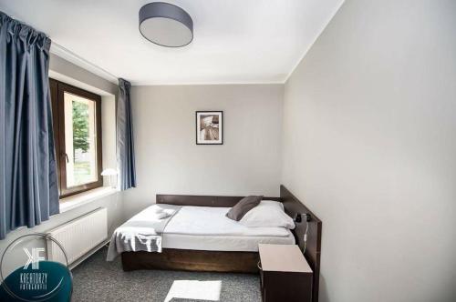 Imagen de la habitación del Hotel Otomin. Foto 7