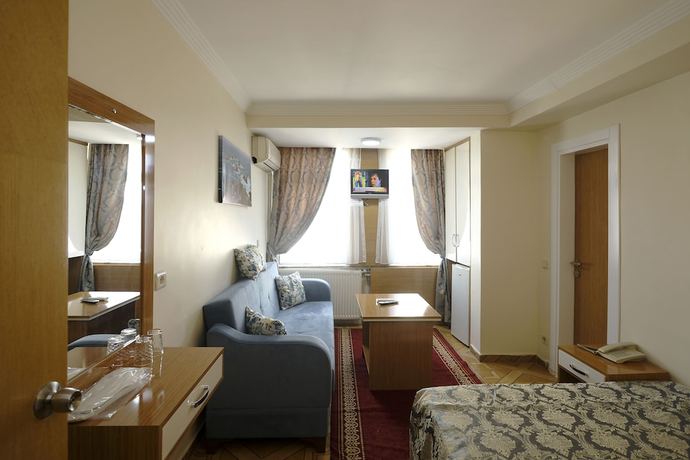 Imagen de la habitación del Hotel Ozbek. Foto 12