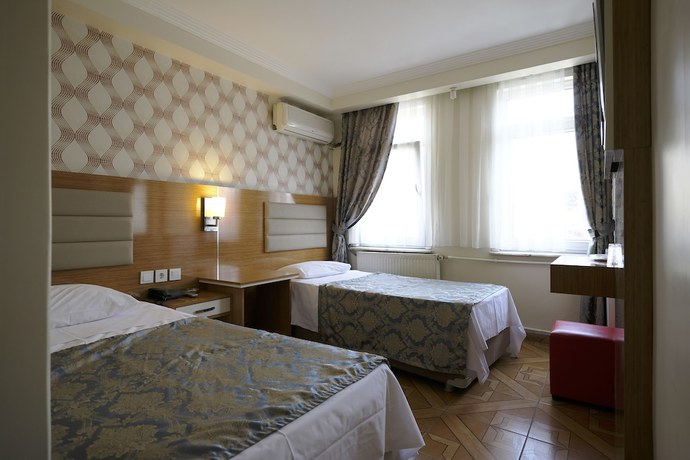 Imagen de la habitación del Hotel Ozbek. Foto 13