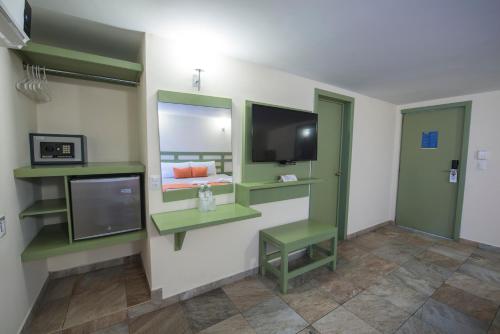 Imagen de la habitación del Hotel Palace Inn. Foto 19