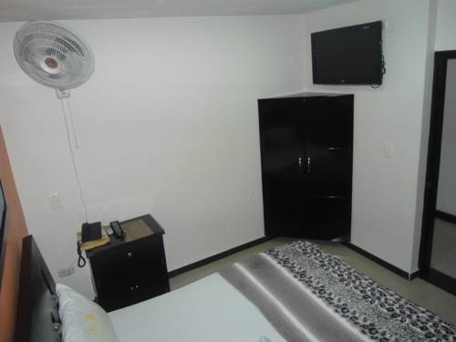 Imagen de la habitación del Hotel Palmeras De Mariana. Foto 1
