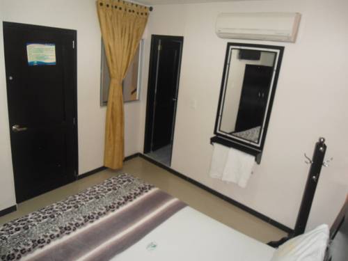Imagen de la habitación del Hotel Palmeras De Mariana. Foto 3