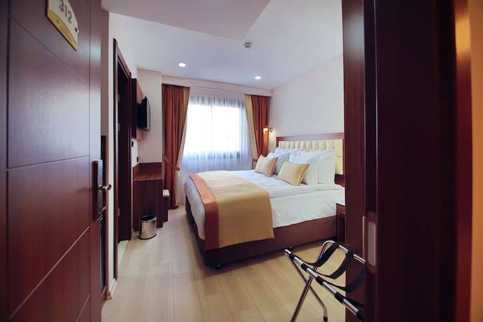 Imagen de la habitación del Hotel Paris Prestige. Foto 9
