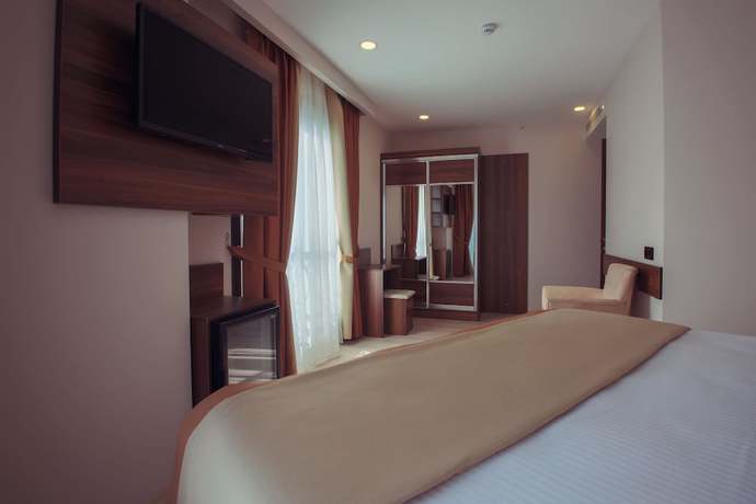 Imagen de la habitación del Hotel Paris Prestige. Foto 10