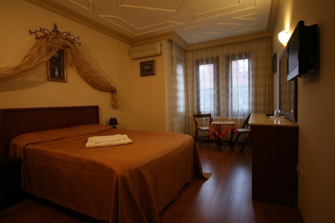 Imagen de la habitación del Hotel Peninsula. Foto 9