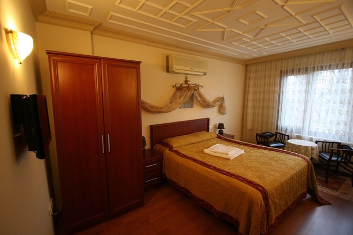 Imagen de la habitación del Hotel Peninsula. Foto 10
