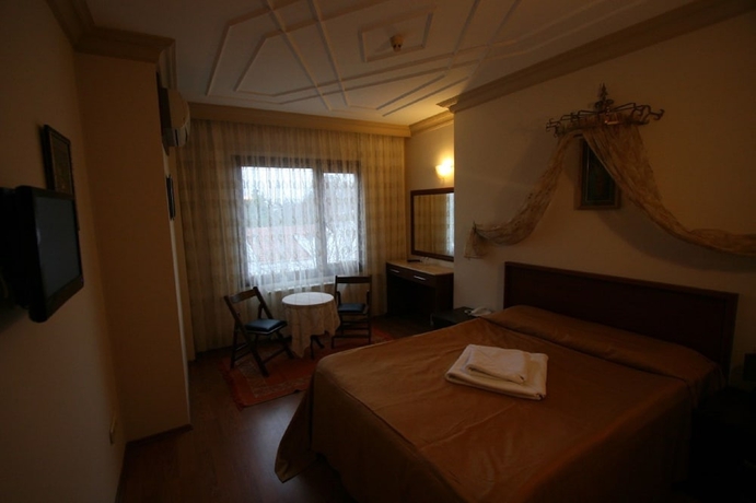 Imagen de la habitación del Hotel Peninsula. Foto 17