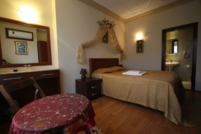 Imagen de la habitación del Hotel Peninsula. Foto 18