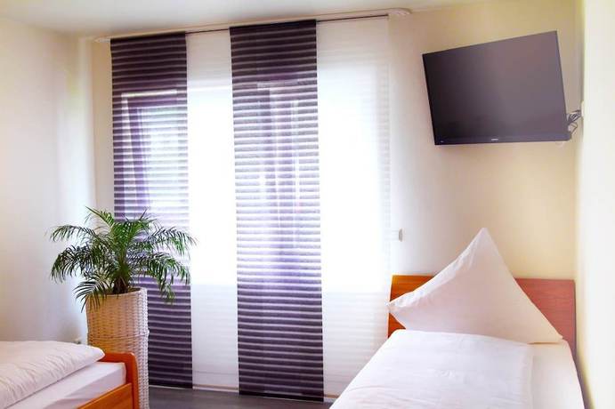 Imagen de la habitación del Hotel Pension Kaempfelbach. Foto 14