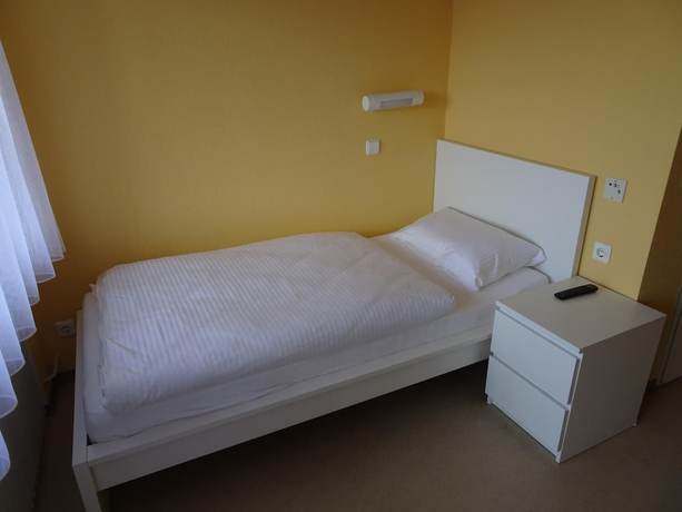 Imagen de la habitación del Hotel - Pension Schlossgarten. Foto 5