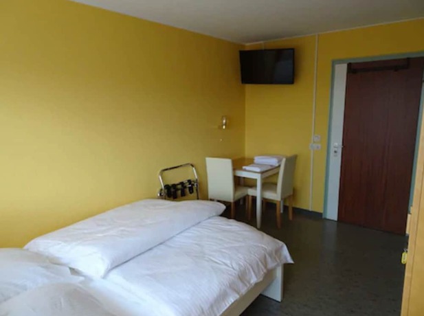 Imagen de la habitación del Hotel - Pension Schlossgarten. Foto 9