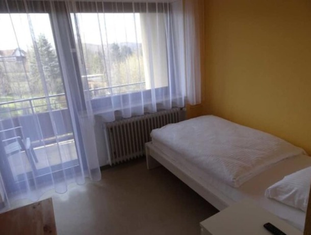 Imagen de la habitación del Hotel - Pension Schlossgarten. Foto 10