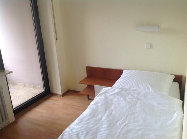 Imagen de la habitación del Hotel - Pension Schlossgarten. Foto 15