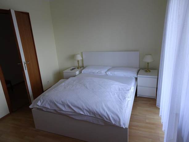 Imagen de la habitación del Hotel - Pension Schlossgarten. Foto 16