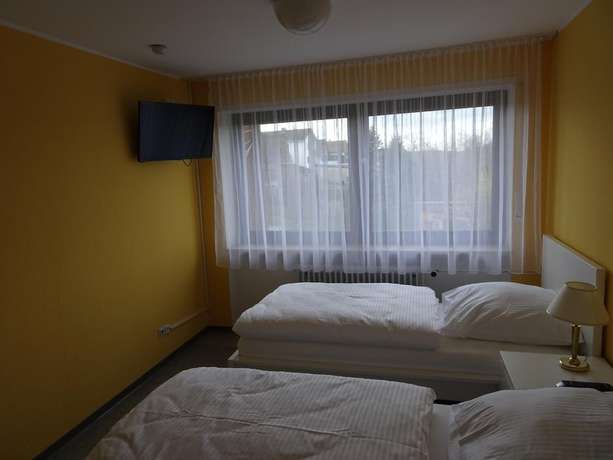 Imagen de la habitación del Hotel - Pension Schlossgarten. Foto 17