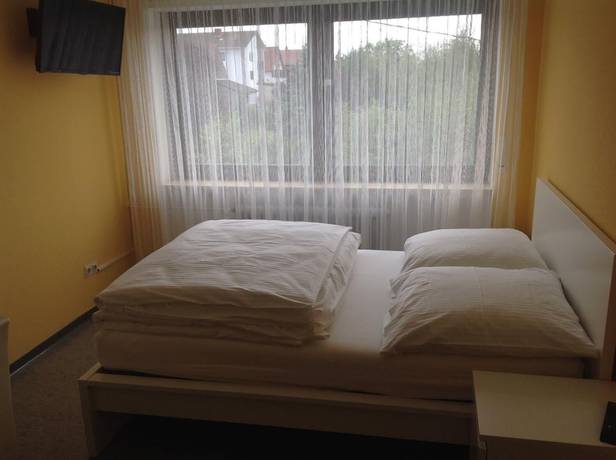 Imagen de la habitación del Hotel - Pension Schlossgarten. Foto 18