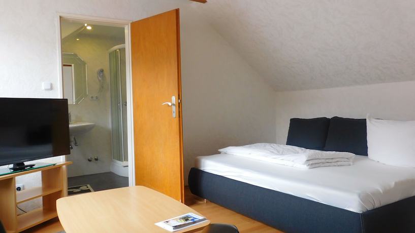 Imagen de la habitación del Hotel Pension am Kurmittelhaus. Foto 10