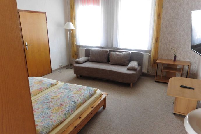 Imagen de la habitación del Hotel Pension am Kurmittelhaus. Foto 17