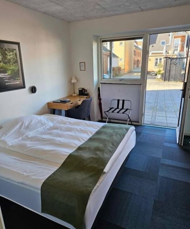 Imagen de la habitación del Hotel Ph&oslash;nix. Foto 9