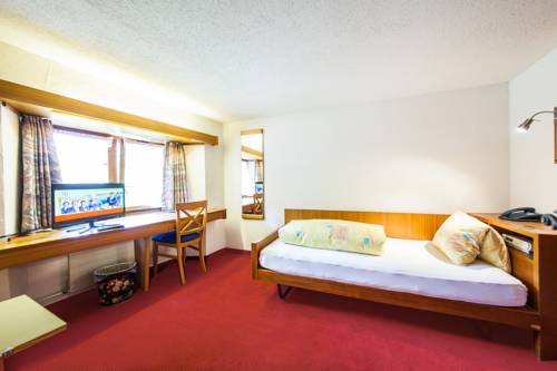 Imagen de la habitación del Hotel Piz Tambo. Foto 10
