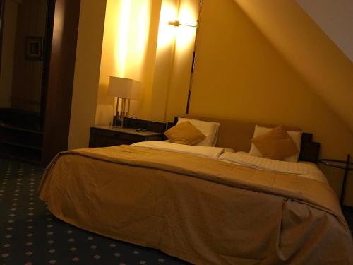 Imagen de la habitación del Hotel Podzamcze. Foto 5
